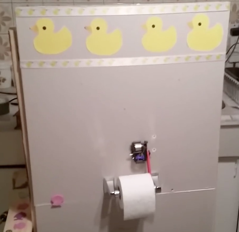 Useless toilet paper machine - W.I.R.E.